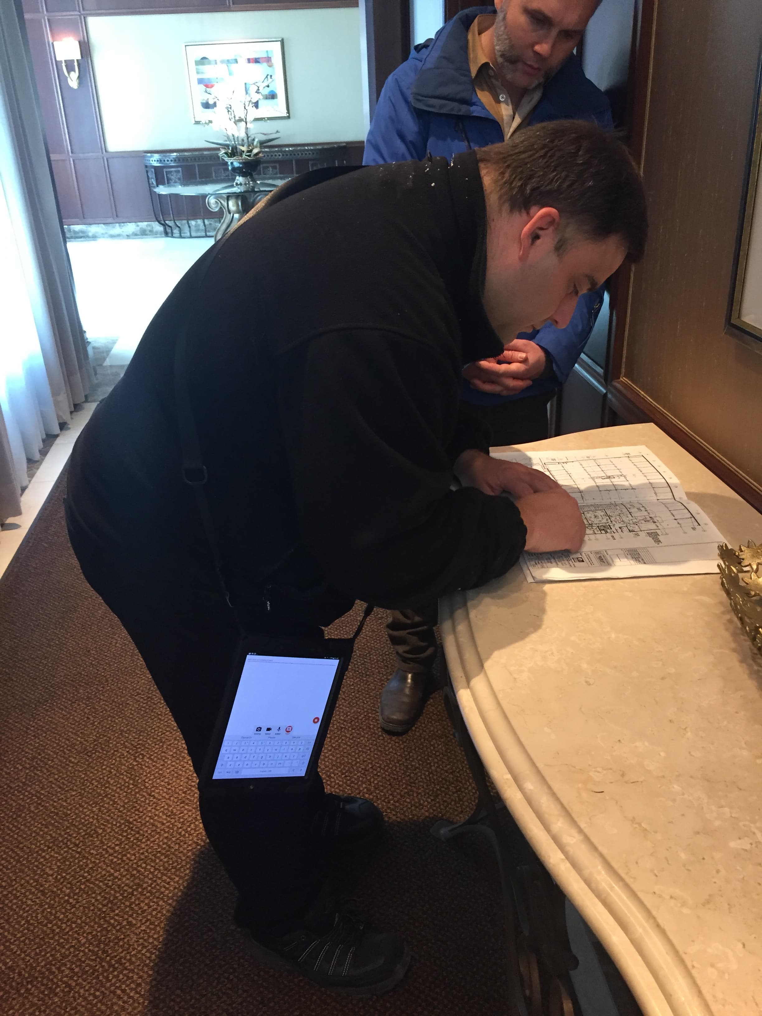 Tablet rotates 180° in lanyard holder — unexpected friction